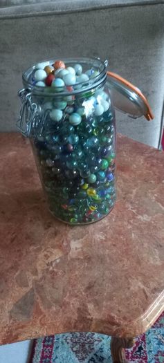 Antique collection of old marbles in large clip sealed jar it's full to the top loft find from very old house in France Beautiful