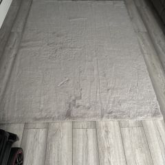 Grey rabbit fur rug