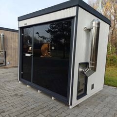 Sauna with wood fire stove