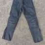 Leather biker pants and helmet Image 4