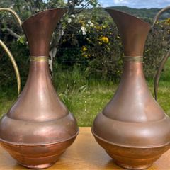 Pair of antique copper jugs