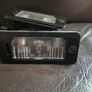 bmw e61 oem reg plate lights set Image 2