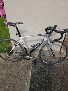 Racing  bike, helmet,  and pedals