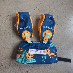 Adjustable Swimming Armbands and Belt Set from Decathlon, featuring a blue and orange tiger design. For children weighing 15 to 30 kg
