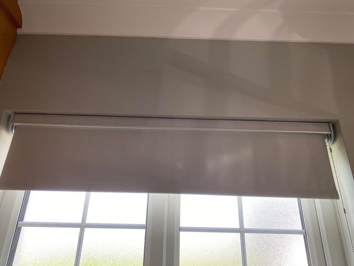 3 elegant roller blinds with open cassette pelmet.