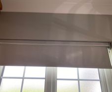 3 elegant roller blinds with open cassette pelmet.