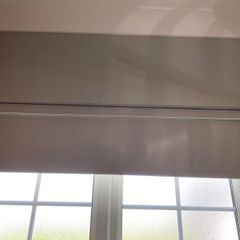 3 elegant roller blinds with open cassette pelmet.