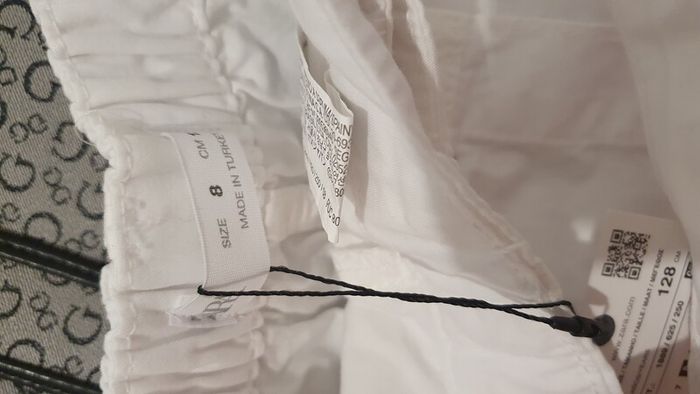 white pleated skirt