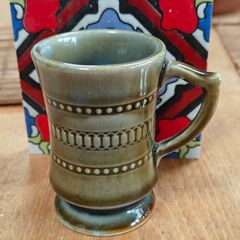 vintage Wade Irish Porcelain  small mug and salt and pepper holders featuring a blue-green glaze.