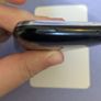 Locked iPhone missing top button crack to case Image 2