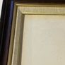 frame A rich dark-wood and gilt picture frame featuring a textured fabric mat liner. Image 4