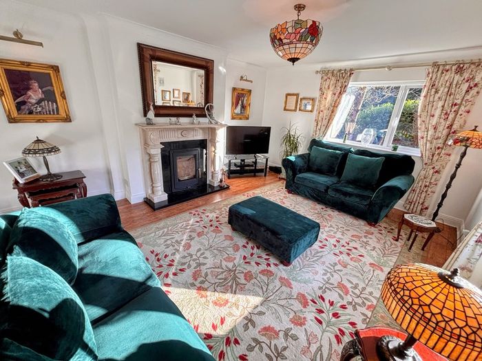 Elegant three piece suite with matching footstool