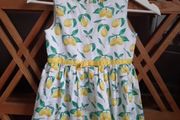 Girls lemon dress size 6-7 years