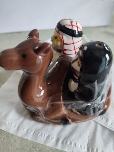 Novelty Cute Middle Eastern Arab Characters Salt & Pepper Cruet Set. On Gamal holder 1x Male Figure + 1x Female Figure. Would Look Great On The Table
