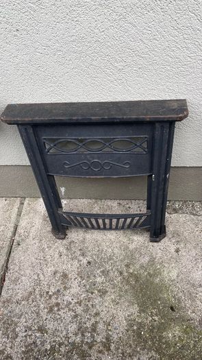 Two cast iron fire surrounds