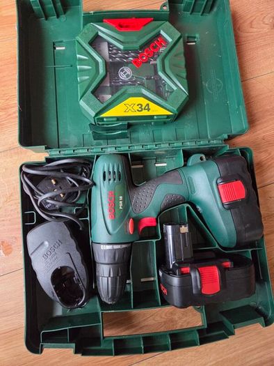 Bosch PSR 18 drill with 2 batteries, charger and brand new bits