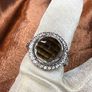 A beautiful silver ring with smokey quartz and white topaz. Image 9