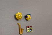Lego heads plus, sax, skirt and comic brick