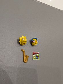 Lego heads plus, sax, skirt and comic brick