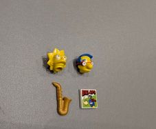 Lego heads plus, sax, skirt and comic brick
