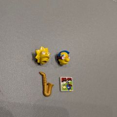 Lego heads plus, sax, skirt and comic brick