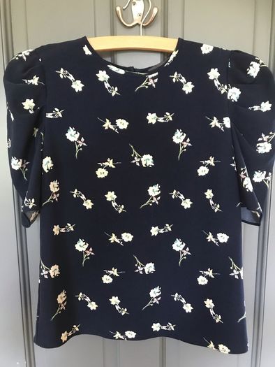 Pennys shirt sleeved girls top aged 10-12 years