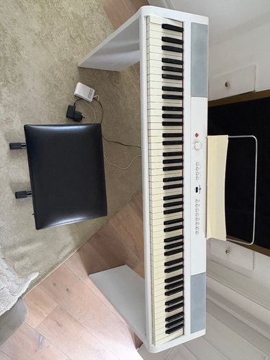 A full 88-key digital piano (gear4music brand)