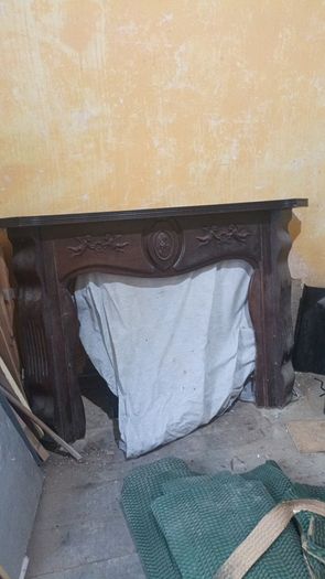 wooden fire place / surround
