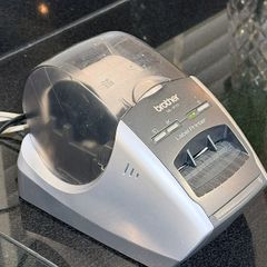 Label printer. Brother QL570. Thermal printing labels.