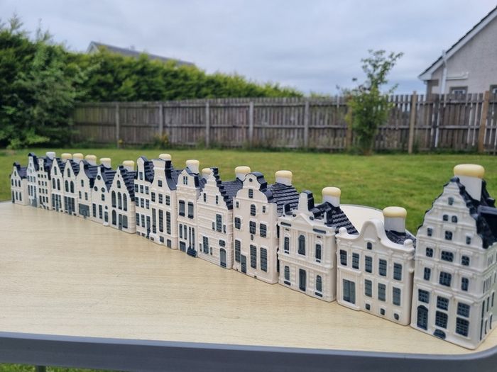 Collection of 16 porcelain miniature houses KLM