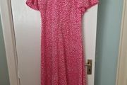 Pink midi dress.