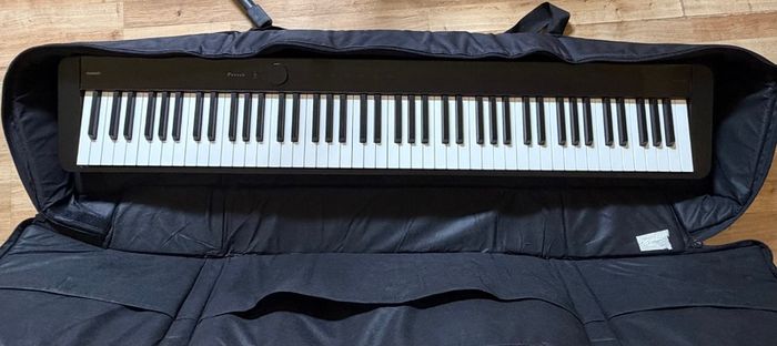 Casio px-s1100 digital piano (Black) + keyboard stand + storage bag