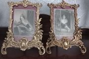 Pair of brass picture frames.