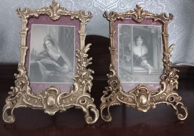 Pair of brass picture frames.