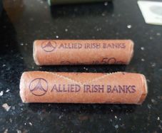 unc roll of penny's two rolls