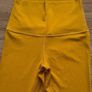 Lululemon Size 6 high-waisted leggings in a rich mustard / golden tone Image 5