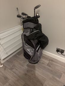 Powakaddy golf  bag and half set of irons