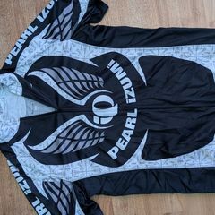 Four Pearl Izumi Jerseys plus Softshell Jacket