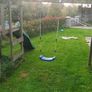 Wooden swing and slide climbing frame Image 2
