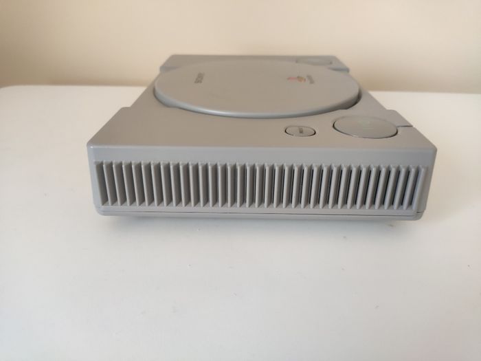 Playstation 1 console SCPH-7502 with games and cords