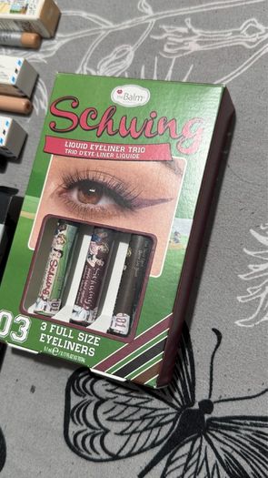 The balm tinted brow gel, clear brow gel, white, black eye pencils, liquid eyeliners