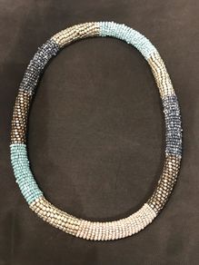 Metallic coloured necklace in tiny beaded pattern