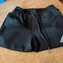 black Adidas Techfit leggings. Image 8