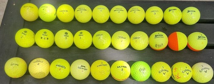 30 preused colored golf balls