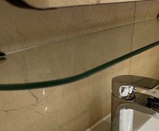 Bathroom glass shelf