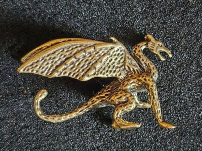 4 brass dragons.