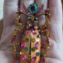 Beautiful brooch in the form of a large beetle with enamel and rhinestones. Image 3