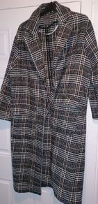 Nice long coat big sizing on label 12 but more a 14 worn once as 2 big