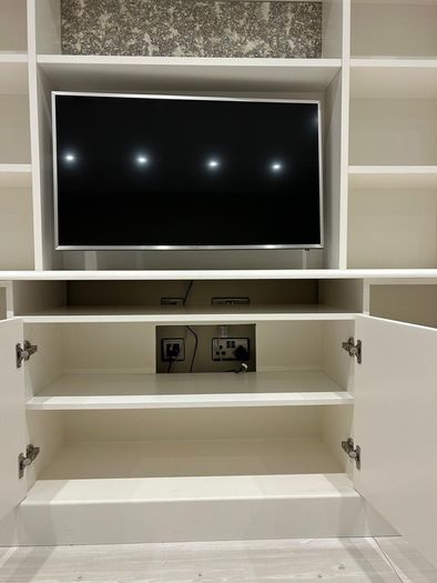 TV Cabinet with shelving and cupboards
