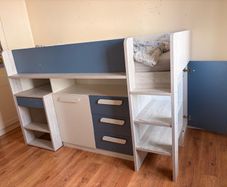 Child midsleeper bed with desk and storage